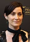 https://upload.wikimedia.org/wikipedia/commons/thumb/1/15/Carrie-Anne_Moss_May_2016.jpg/100px-Carrie-Anne_Moss_May_2016.jpg
